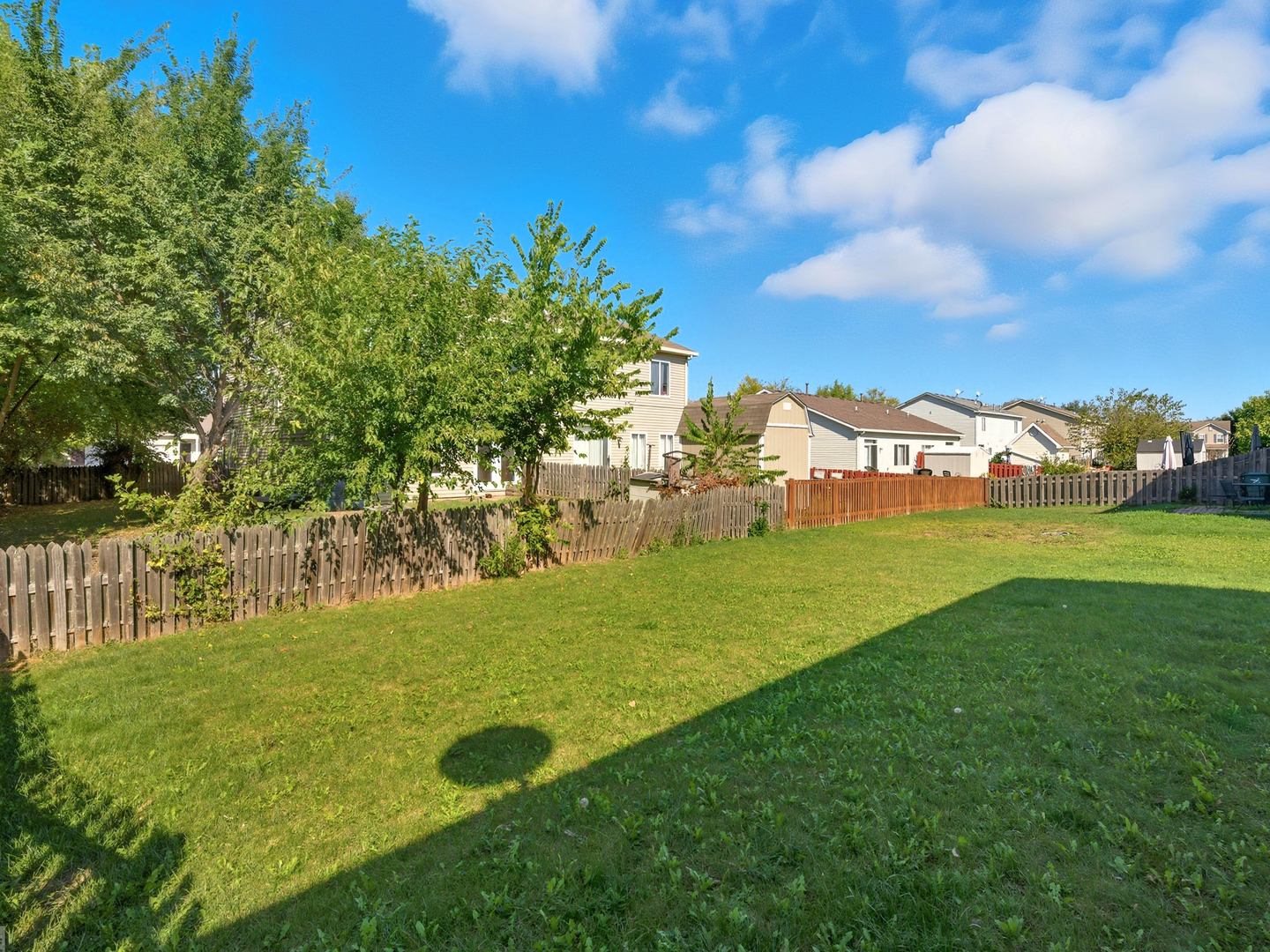 2813 Hoffman Street Plano, IL 60545 - Photo 5 of 27 a view of a golf course with a garden