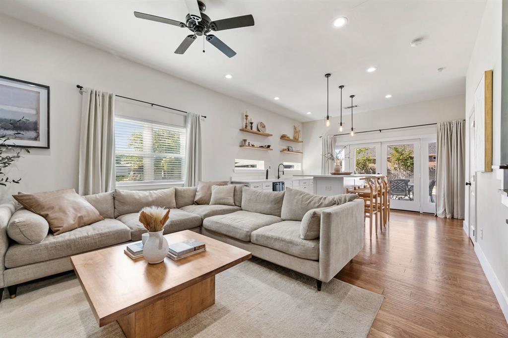 504 Main Street Roanoke, TX 76262 - Photo 11 of 40 a living room with furniture and a large window