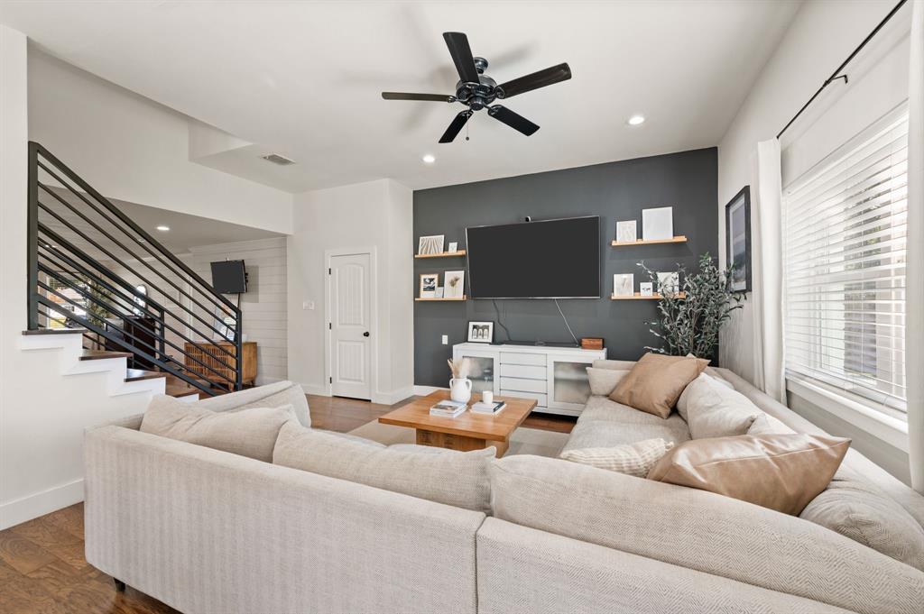 504 Main Street Roanoke, TX 76262 - Photo 12 of 40 a living room with furniture and a large window