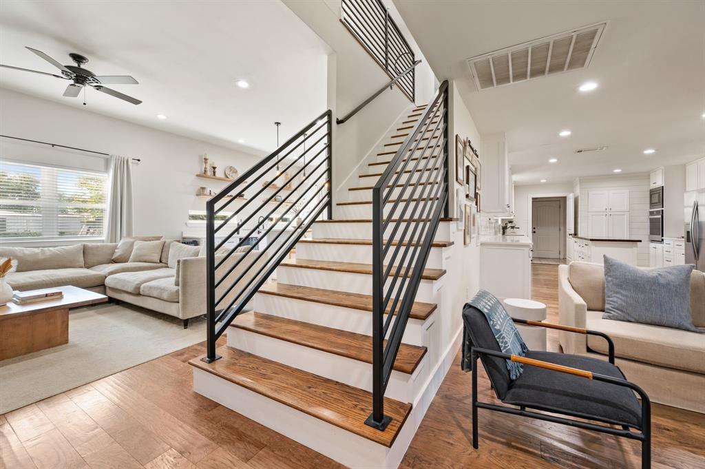 504 Main Street Roanoke, TX 76262 - Photo 23 of 40 a living room with furniture and a wooden floor