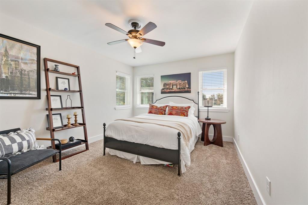 504 Main Street Roanoke, TX 76262 - Photo 28 of 40 a bedroom with a bed furniture and window
