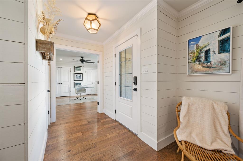 504 Main Street Roanoke, TX 76262 - Photo 3 of 40 a view of a bedroom with wooden floor