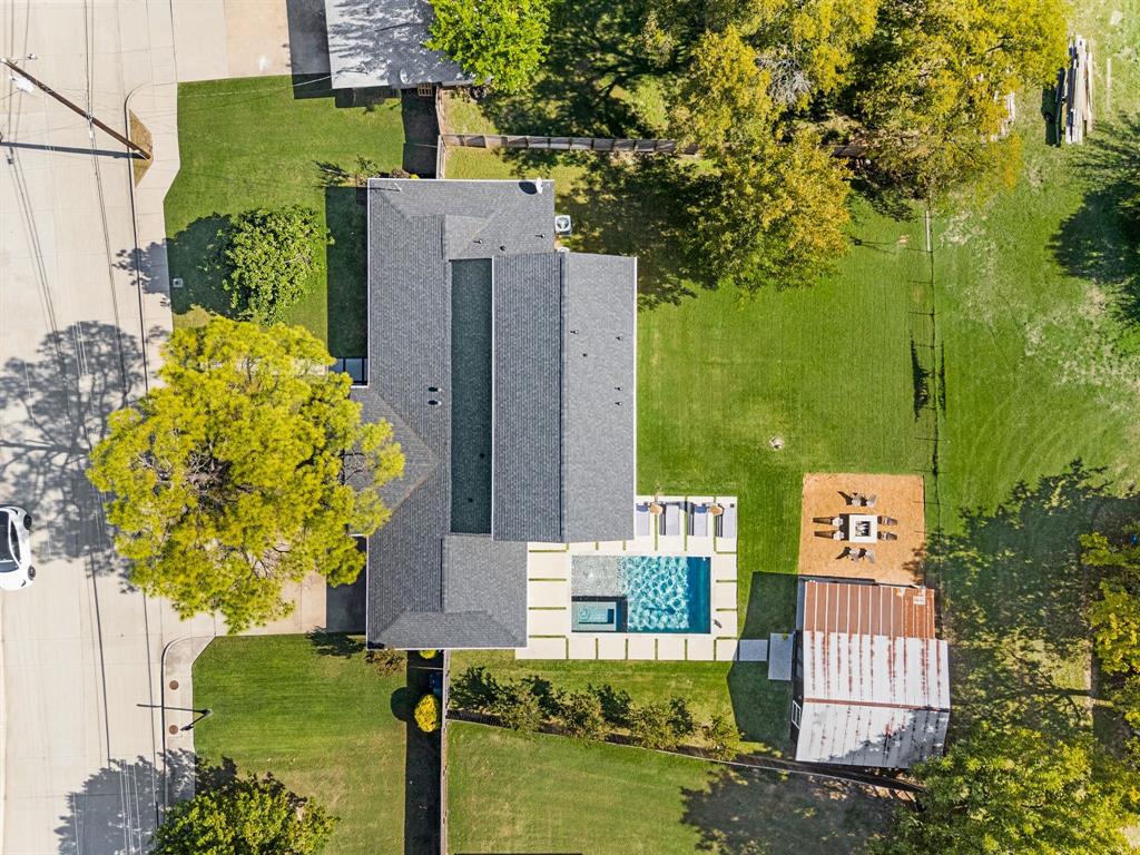 504 Main Street Roanoke, TX 76262 - Photo 38 of 40 an aerial view of a house with a yard swimming pool and outdoor seating
