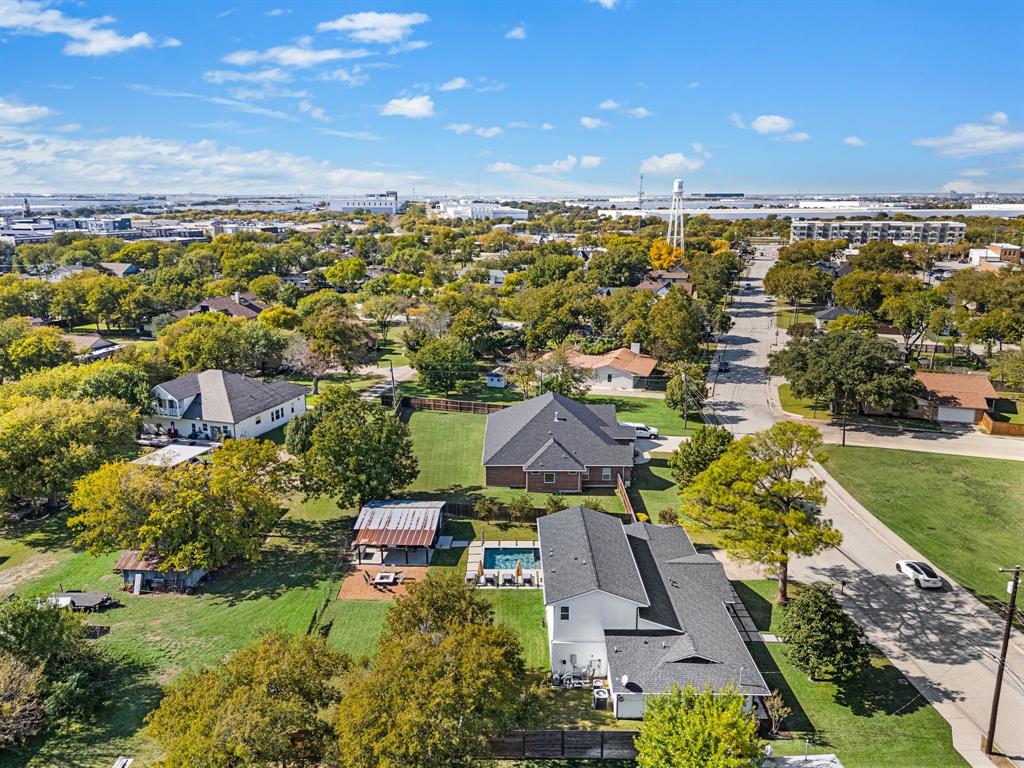 504 Main Street Roanoke, TX 76262 - Photo 39 of 40 an aerial view of a house with a yard