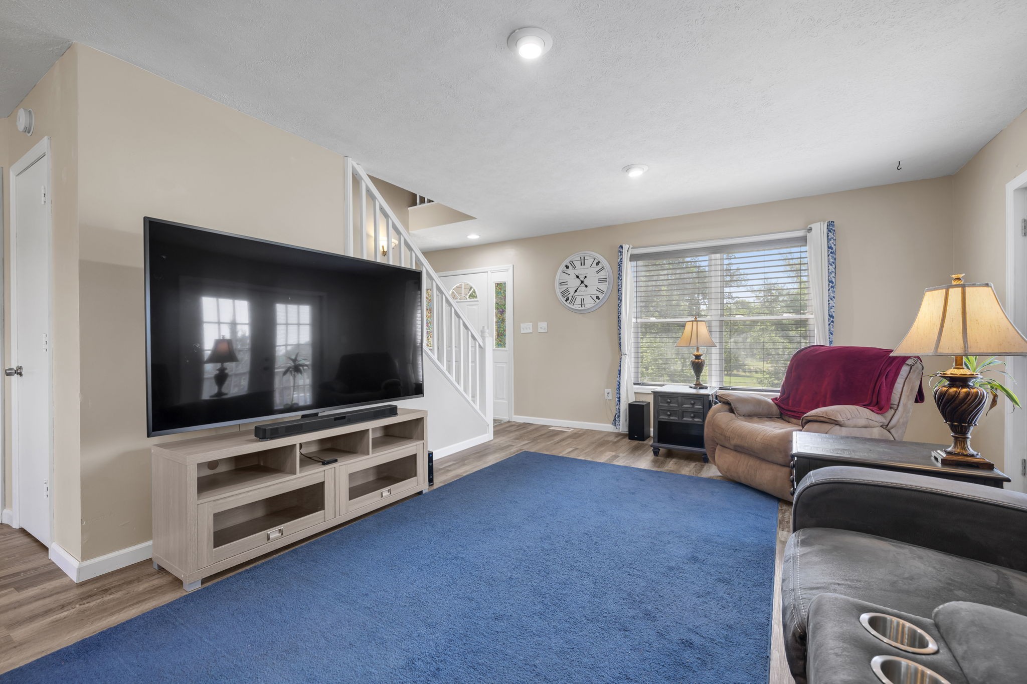 670 Still Pond Road Columbia, TN 38401 - Photo 12 of 43 a living room with furniture and a flat screen tv