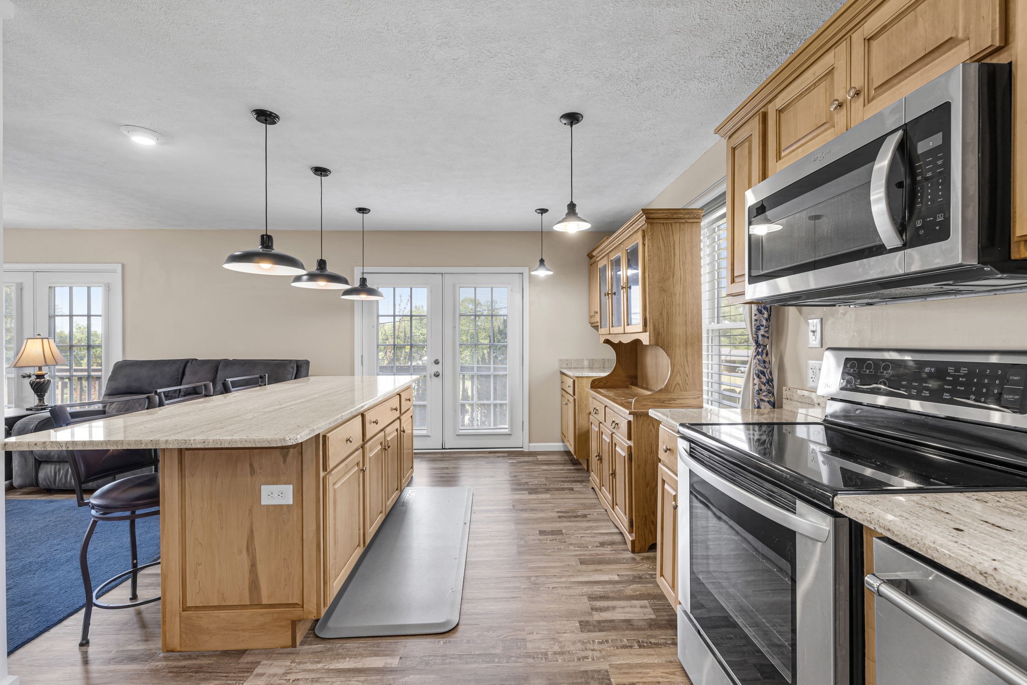 670 Still Pond Road Columbia, TN 38401 - Photo 19 of 43 a kitchen with kitchen island a sink stove and oven