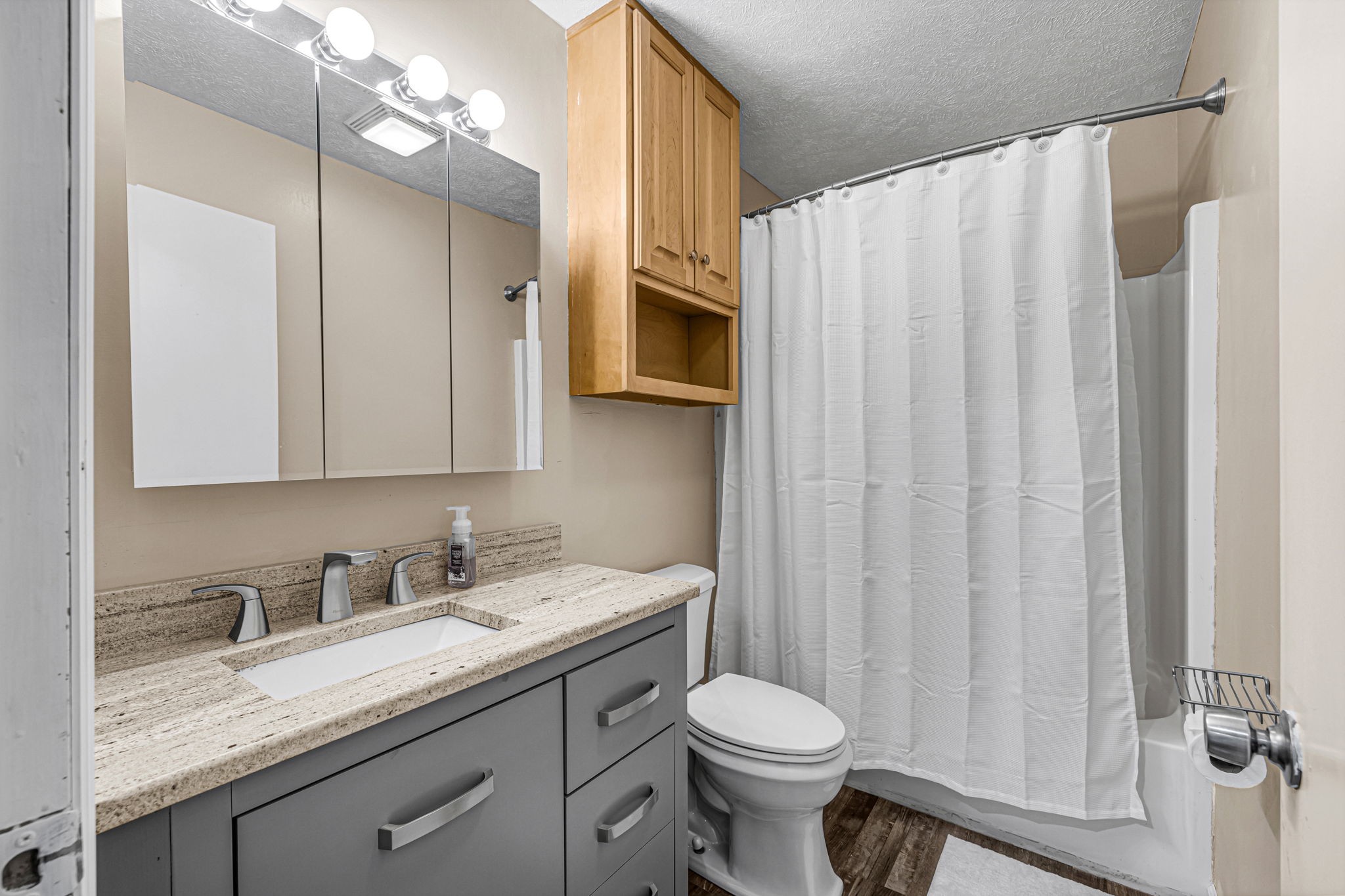 670 Still Pond Road Columbia, TN 38401 - Photo 22 of 43 a bathroom with a granite countertop sink and a mirror