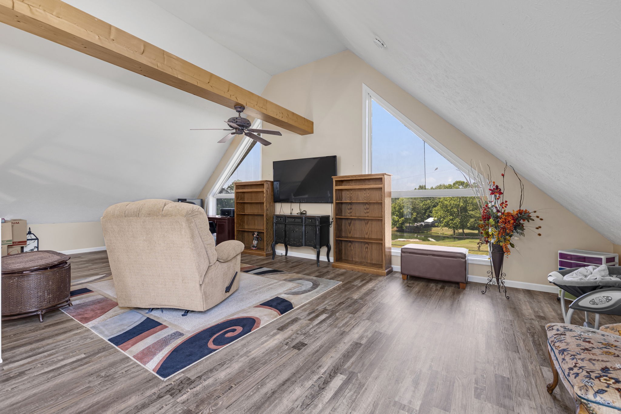 670 Still Pond Road Columbia, TN 38401 - Photo 24 of 43 a living room with furniture and a wooden floor