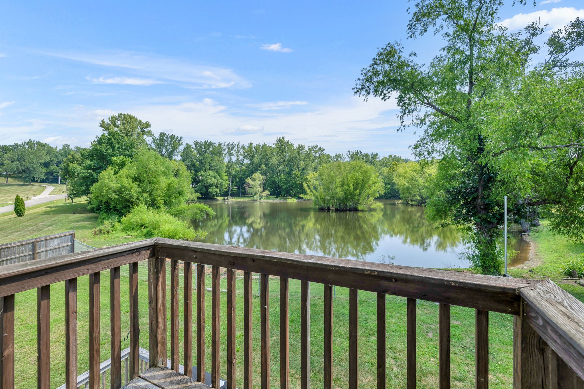 670 Still Pond Road Columbia, TN 38401 - Photo 31 of 43 a balcony with trees in front of it