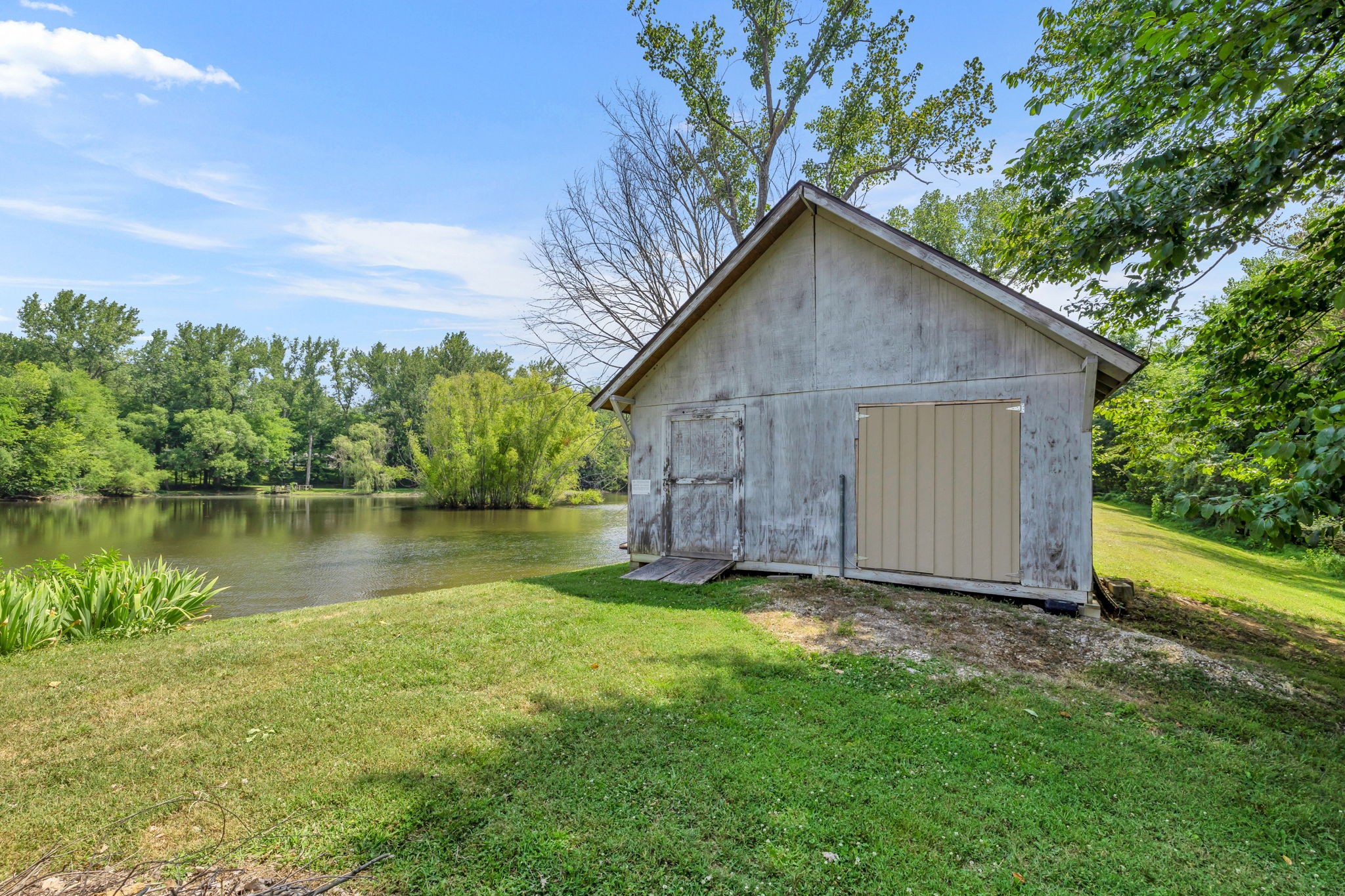670 Still Pond Road Columbia, TN 38401 - Photo 35 of 43 a view of a house with a yard