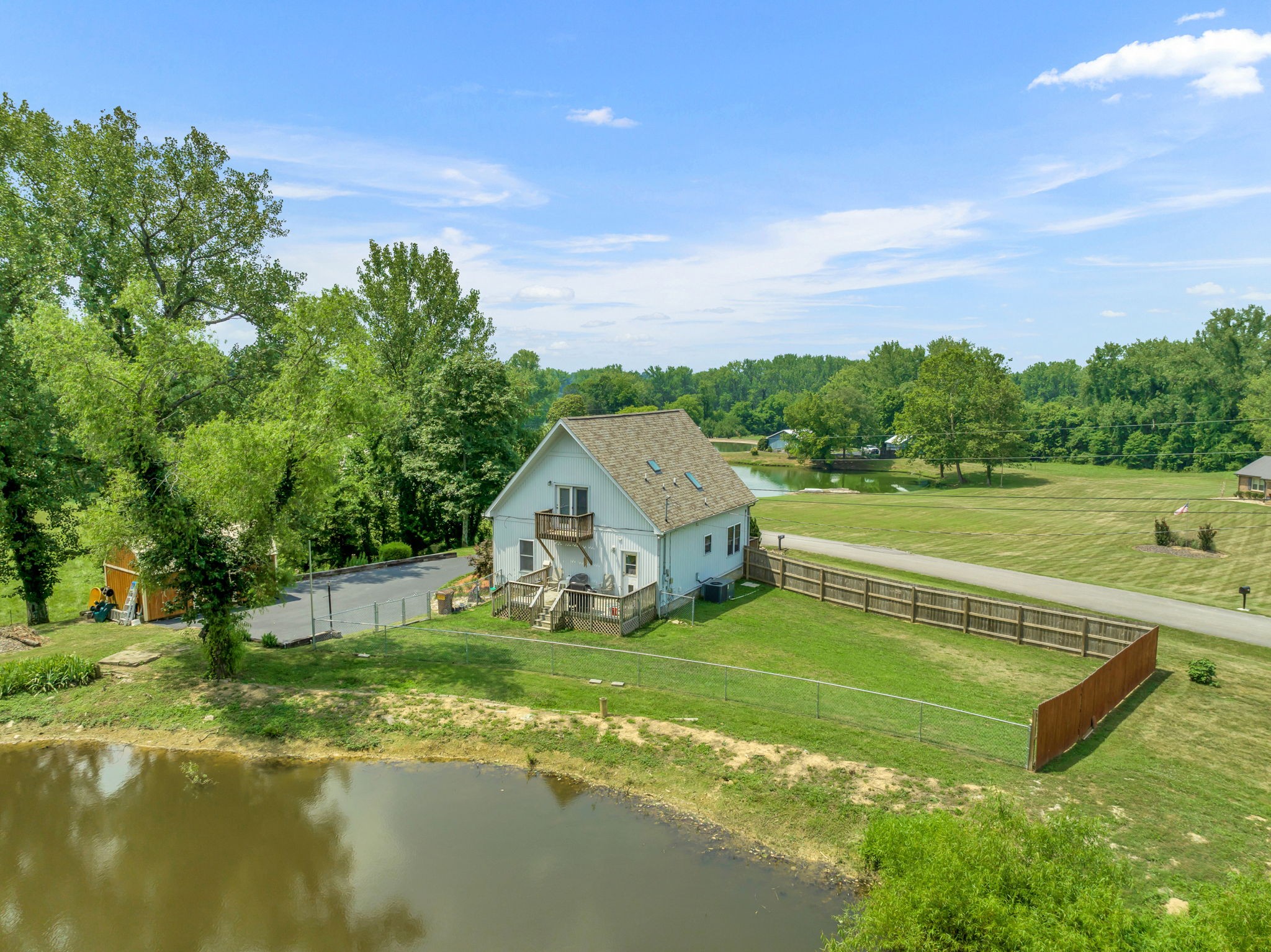670 Still Pond Road Columbia, TN 38401 - Photo 40 of 43 a view of a house with a big yard
