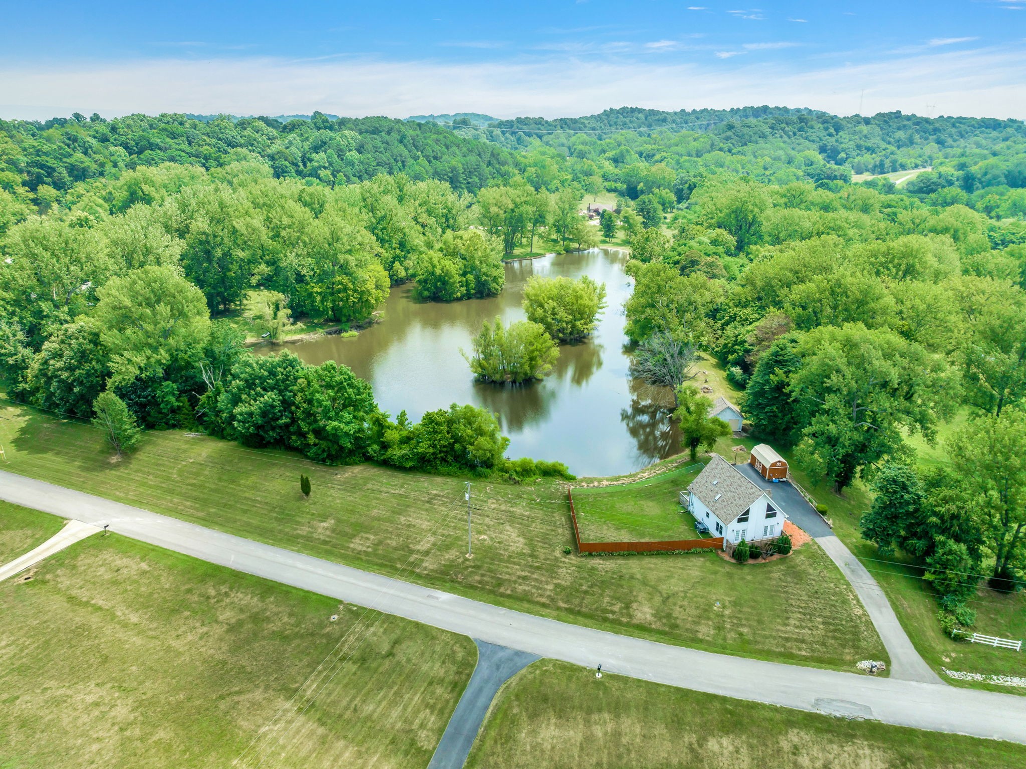 670 Still Pond Road Columbia, TN 38401 - Photo 4 of 43 a view of a lake with a yard
