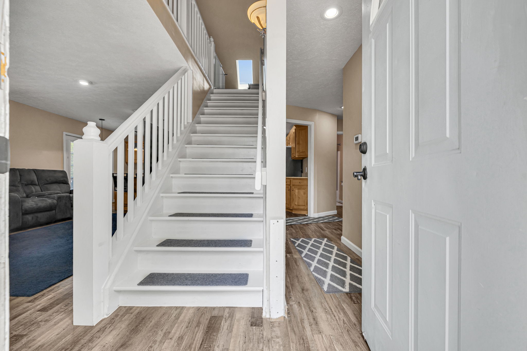 670 Still Pond Road Columbia, TN 38401 - Photo 8 of 43 a view of a hallway with wooden floor and entryway