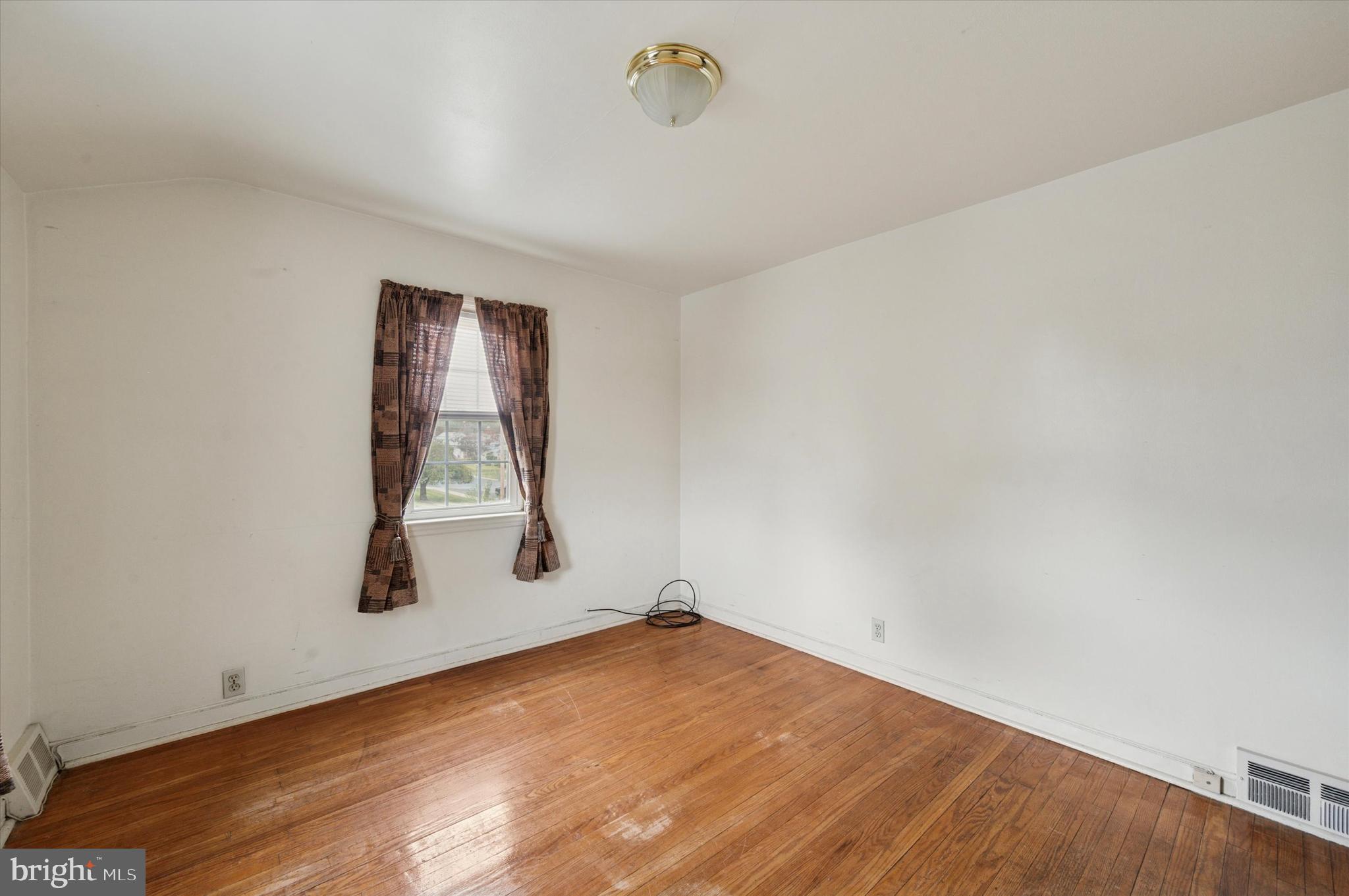 363 Holmes Road Holmes, PA 19043 - Photo 22 of 25 an empty room with windows