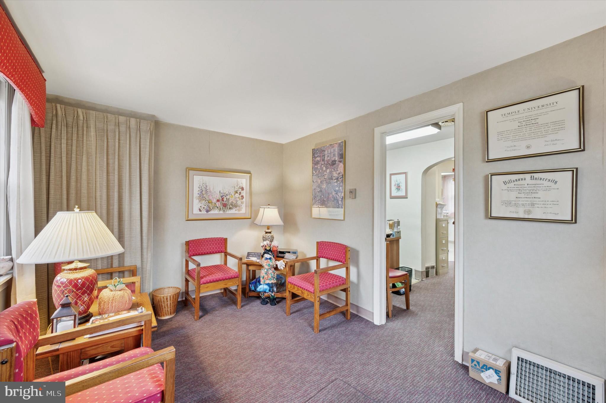 363 Holmes Road Holmes, PA 19043 - Photo 3 of 25 a living room with furniture and a baby crib