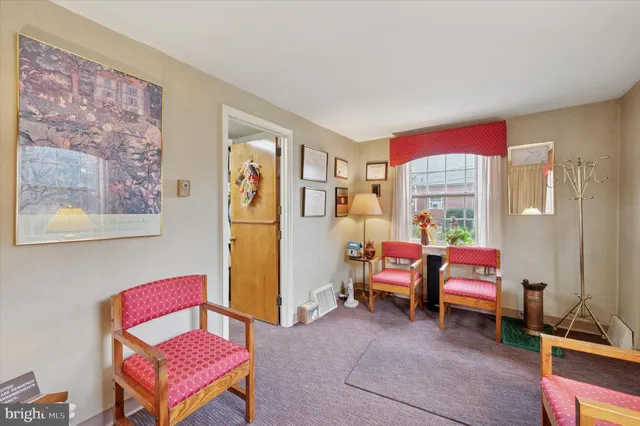 a room with furniture and a window