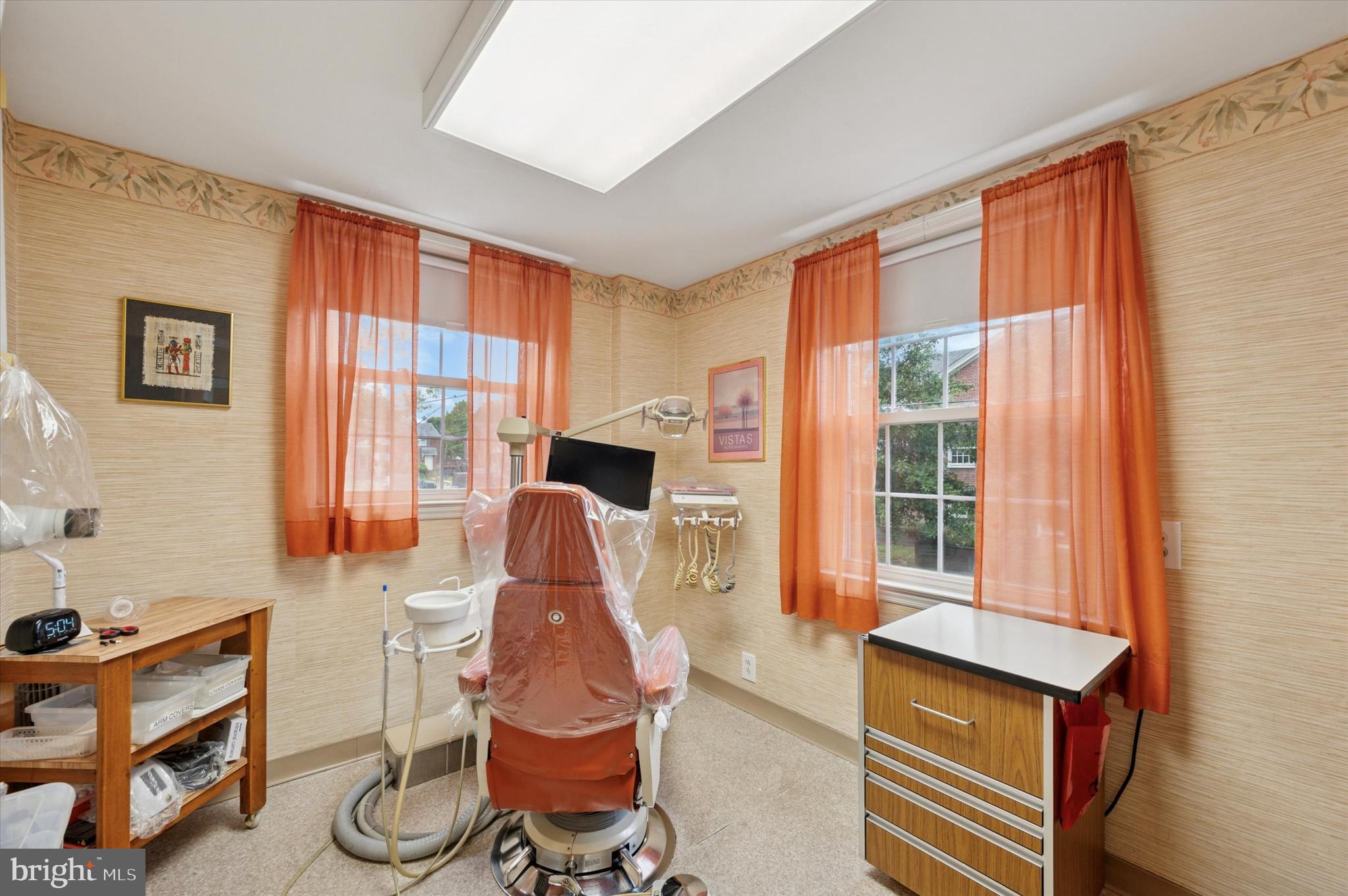 363 Holmes Road Holmes, PA 19043 - Photo 9 of 25 a living room with furniture a flat screen tv and a window