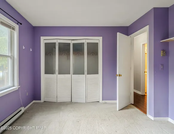 an empty room with window