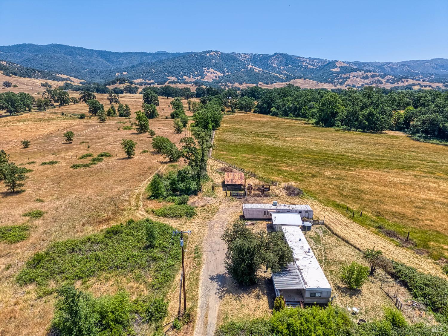 9705 East Potter Valley Road Potter Valley, CA 95469 - Photo 3 of 16 a view of a city with an ocean