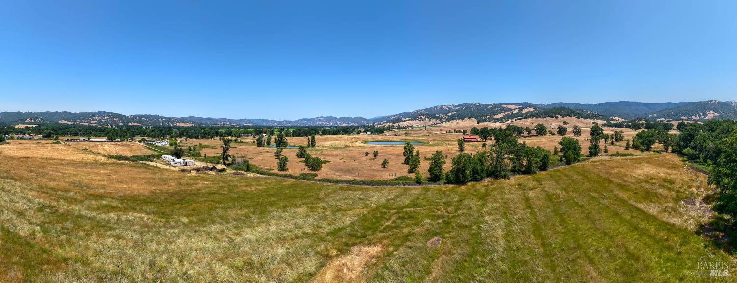 9705 East Potter Valley Road Potter Valley, CA 95469 - Photo 10 of 16 a view of lake with mountain