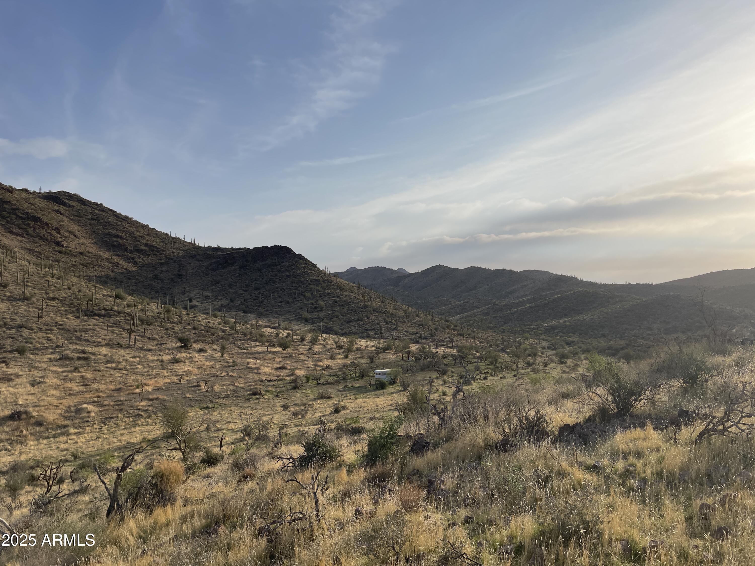 9 North Elephant Butte Road, Unit H Gold Canyon, AZ 85118 - Photo 3 of 9 a view of mountain with sunset