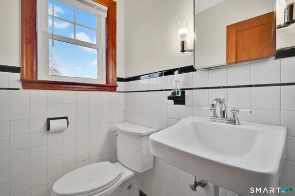 a view of a bedroom with washer and dryer