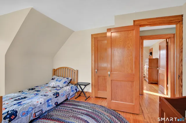 a view of a front door and bedroom