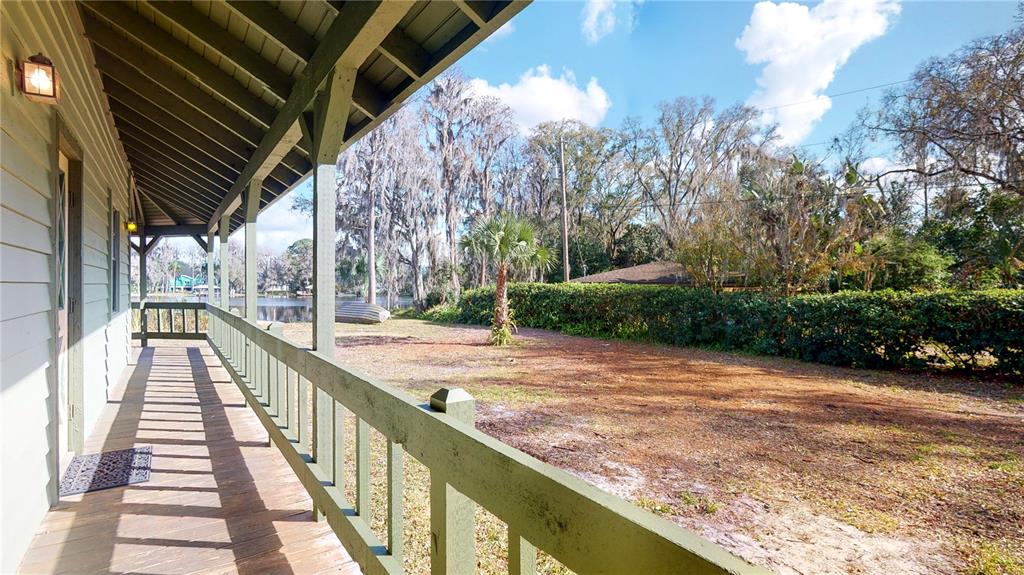 19803 Reading Road Lutz, FL 33558 - Photo 16 of 48 a view of balcony with wooden floor