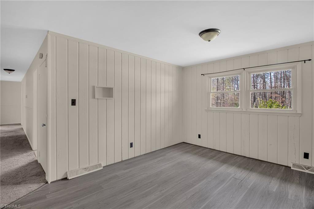8225 Easley Road Walnut Cove, NC 27052 - Photo 11 of 33 Naturally lit dining room looking down the hallway