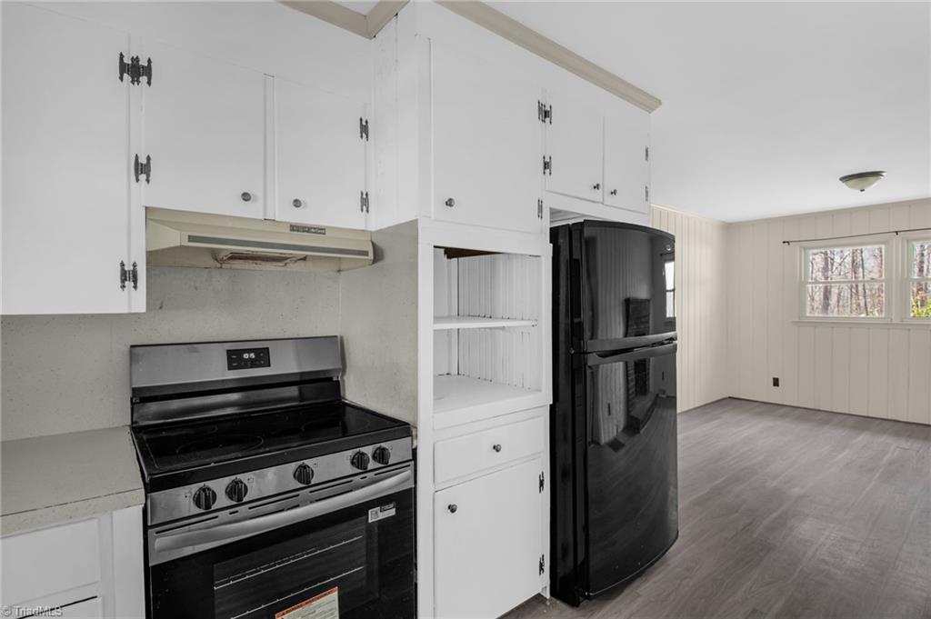 8225 Easley Road Walnut Cove, NC 27052 - Photo 14 of 33 Kitchen close up of stove, storage space and refrigerator