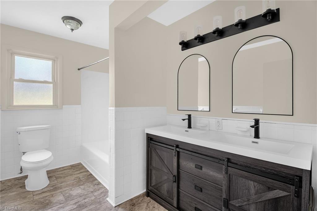 8225 Easley Road Walnut Cove, NC 27052 - Photo 22 of 33 Full hallway bathroom.