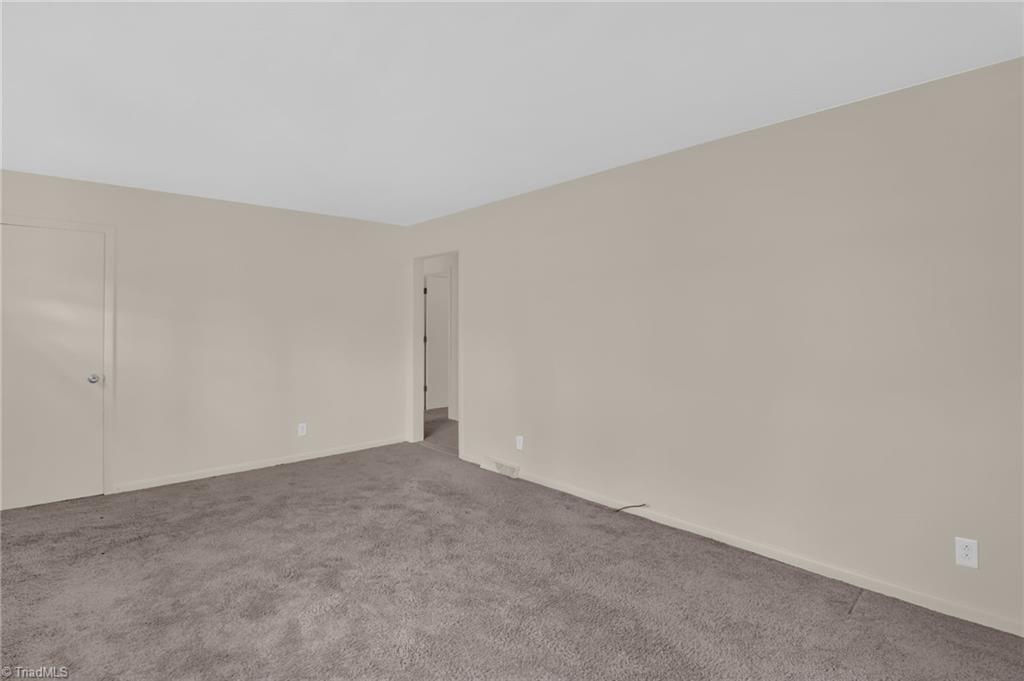 8225 Easley Road Walnut Cove, NC 27052 - Photo 7 of 33 Living Room with coat closet and hallway