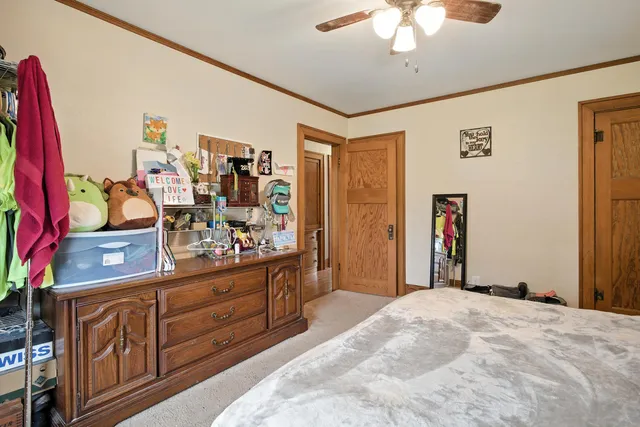 a work room with furniture and a window