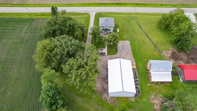 a view of a backyard with a small cabin