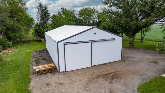 a view of a park with large trees