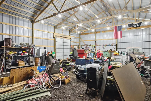 a picture of a bench in front of a wall