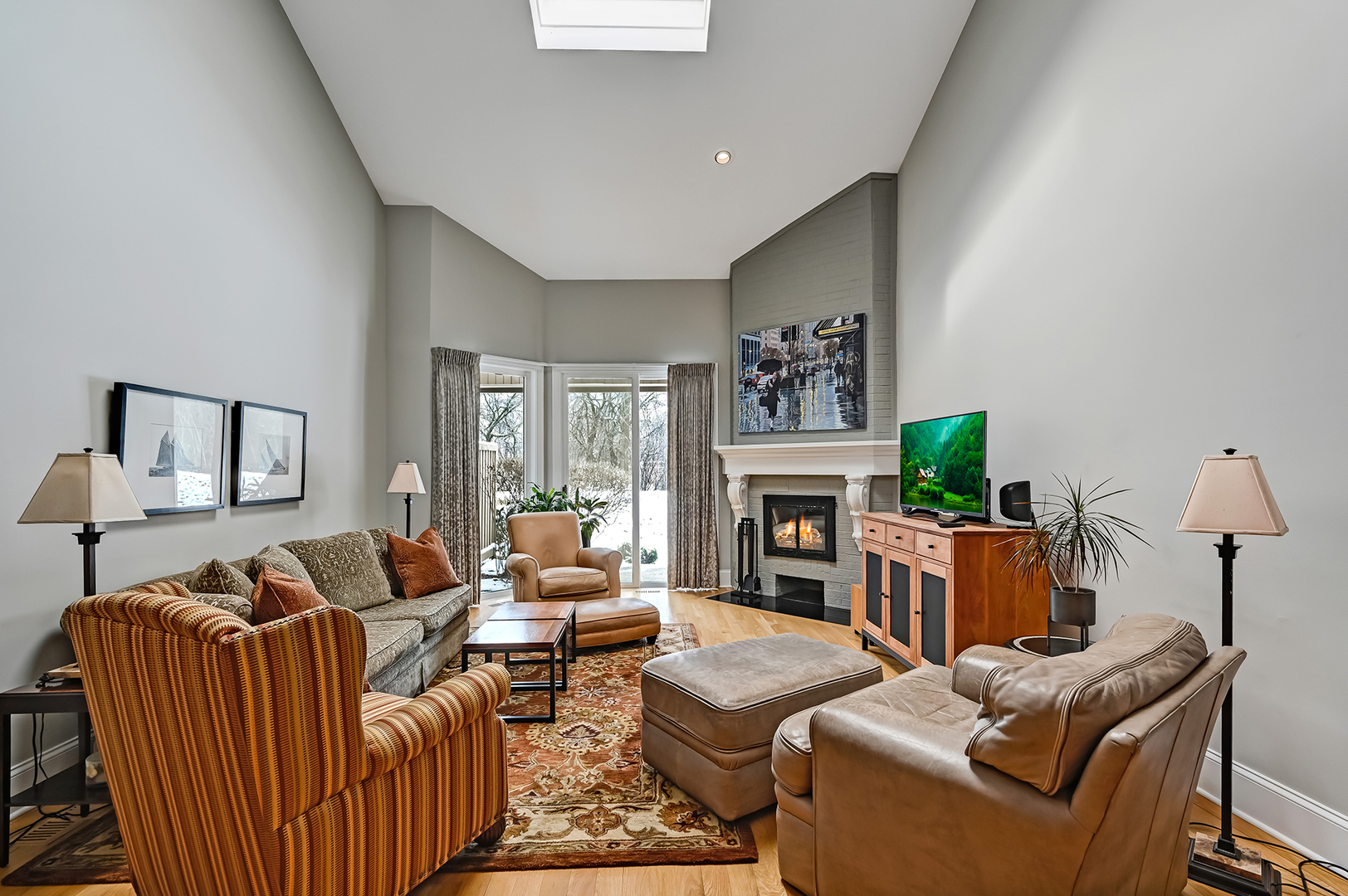 1208 Indian Trail Road, Unit 3E Hinsdale, IL 60521 - Photo 2 of 24 a living room with furniture and a fireplace
