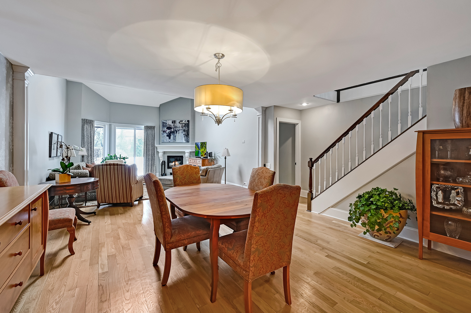 1208 Indian Trail Road, Unit 3E Hinsdale, IL 60521 - Photo 4 of 24 a view of a dining room with furniture and wooden floor