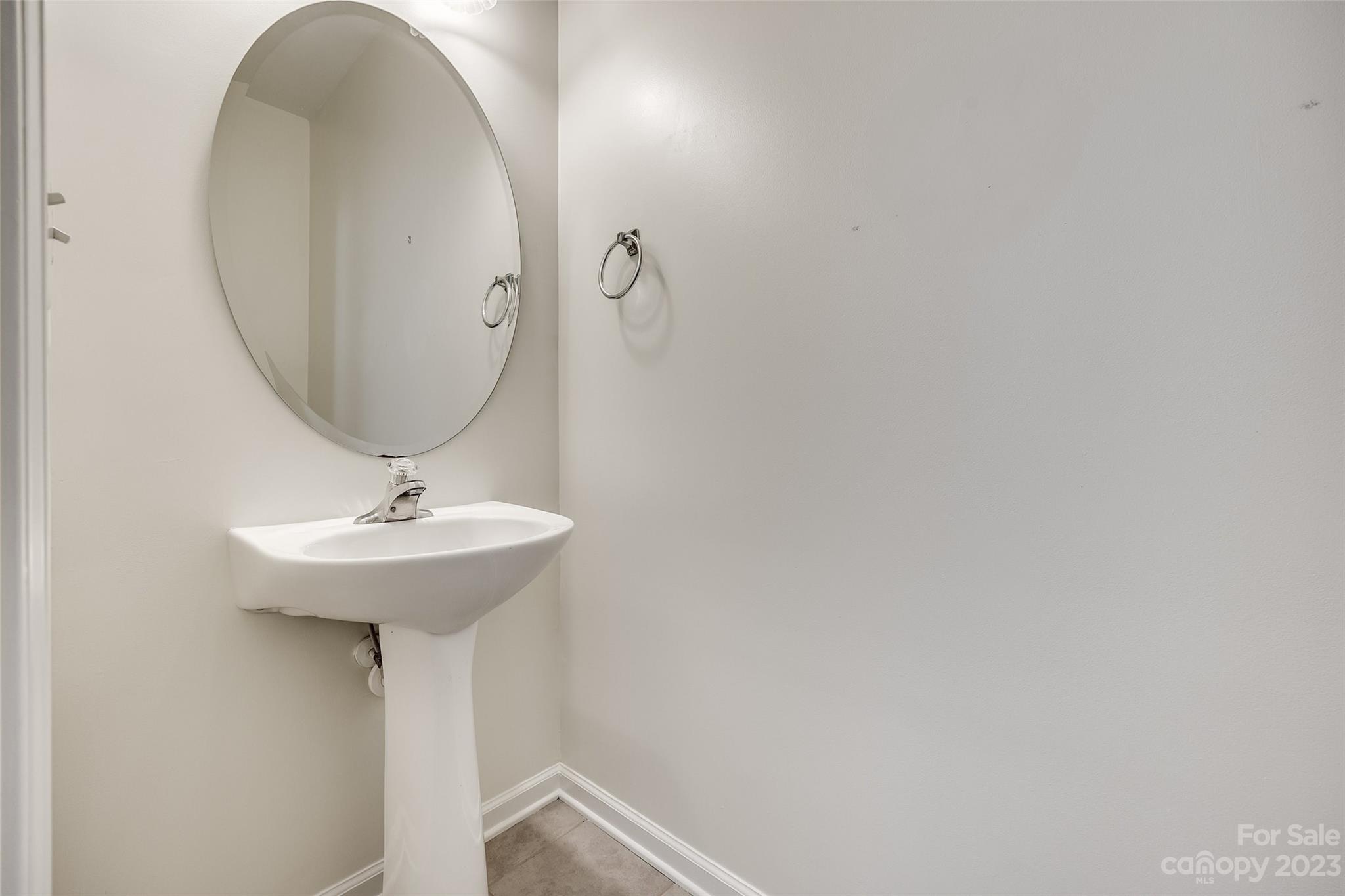 958 Copperstone Lane Fort Mill, SC 29708 - Photo 18 of 29 a bathroom with a sink and mirror
