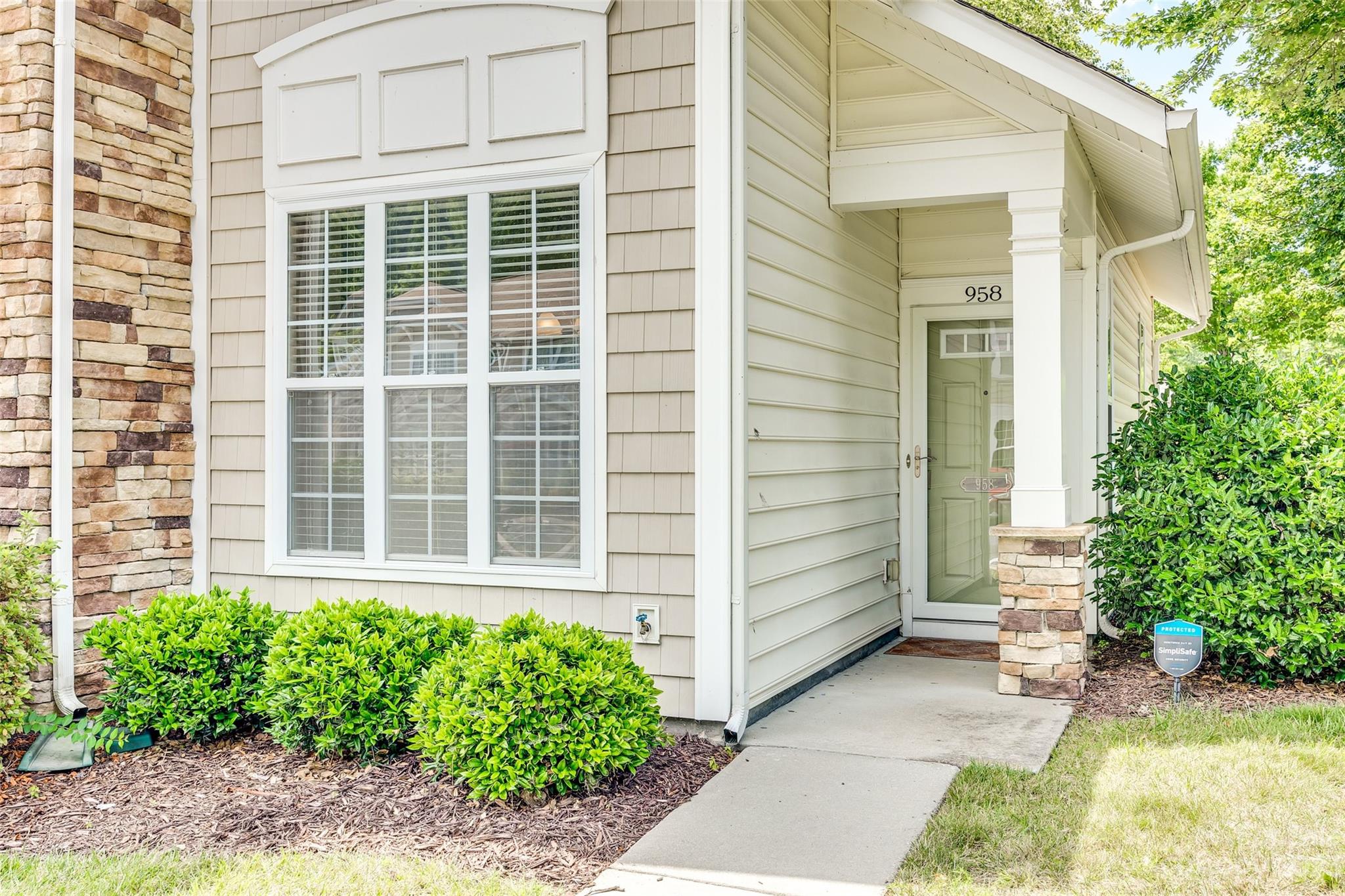958 Copperstone Lane Fort Mill, SC 29708 - Photo 2 of 29 a front view of a house with a garden