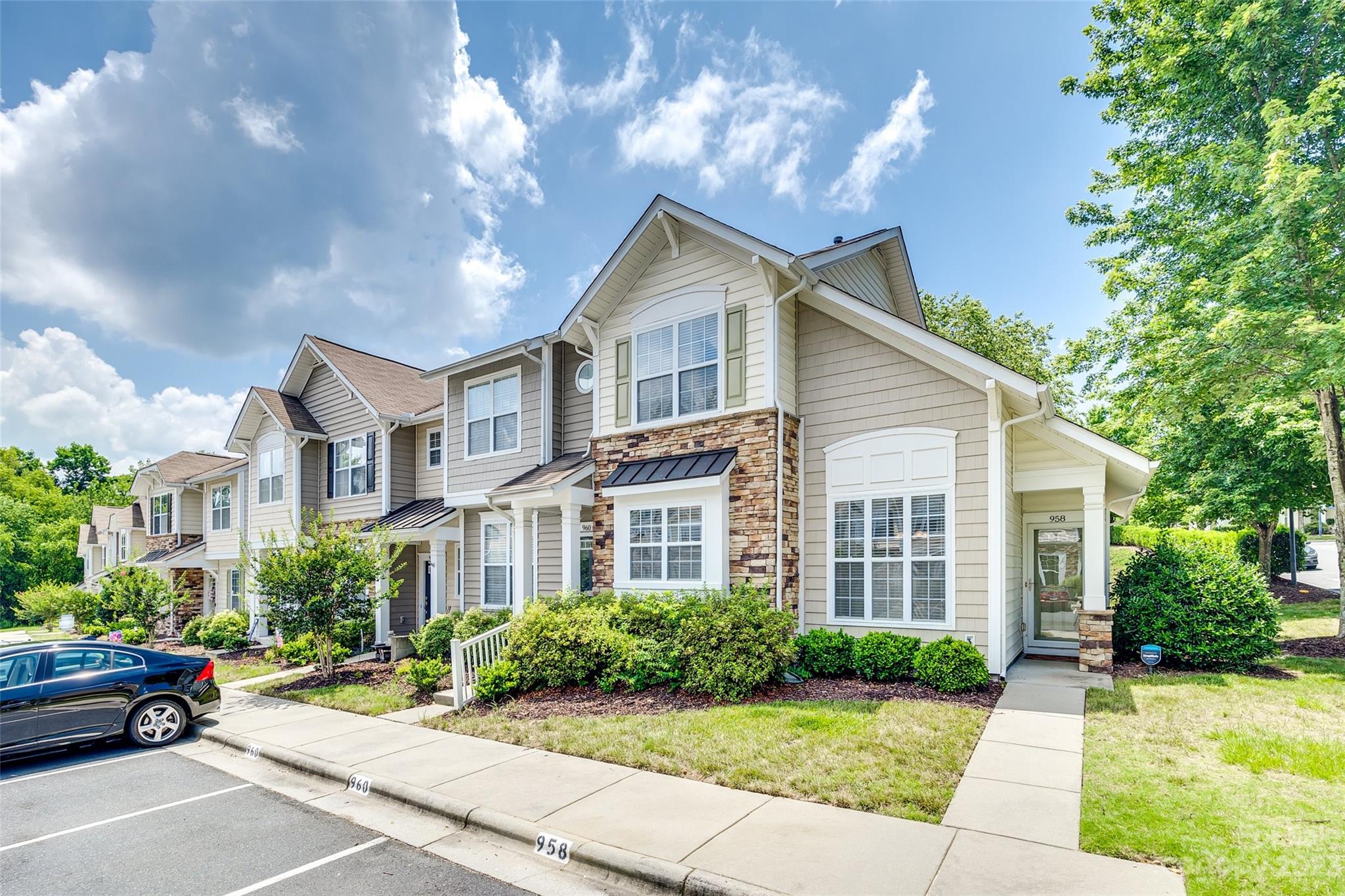 958 Copperstone Lane Fort Mill, SC 29708 - Photo 29 of 29 a view of a house with a yard and potted plants