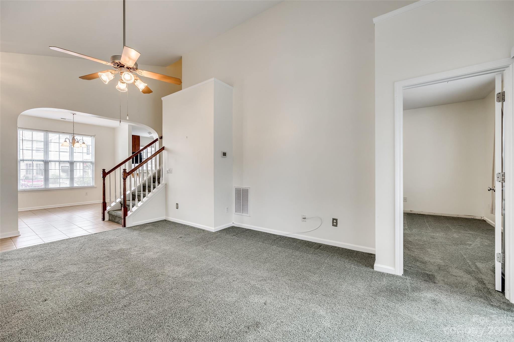 958 Copperstone Lane Fort Mill, SC 29708 - Photo 6 of 29 an empty room with windows and fan