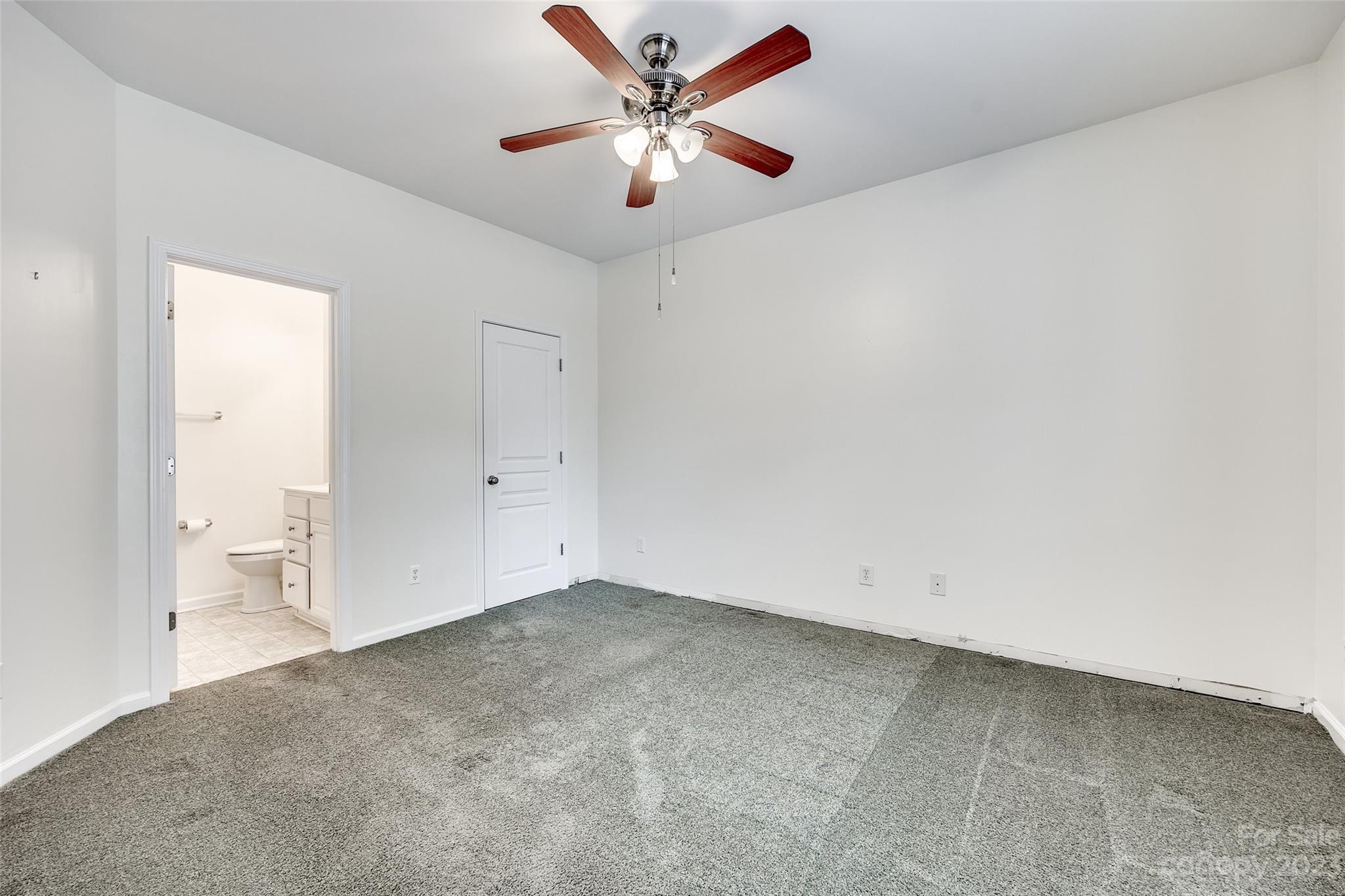 958 Copperstone Lane Fort Mill, SC 29708 - Photo 7 of 29 an empty room with closet and fan