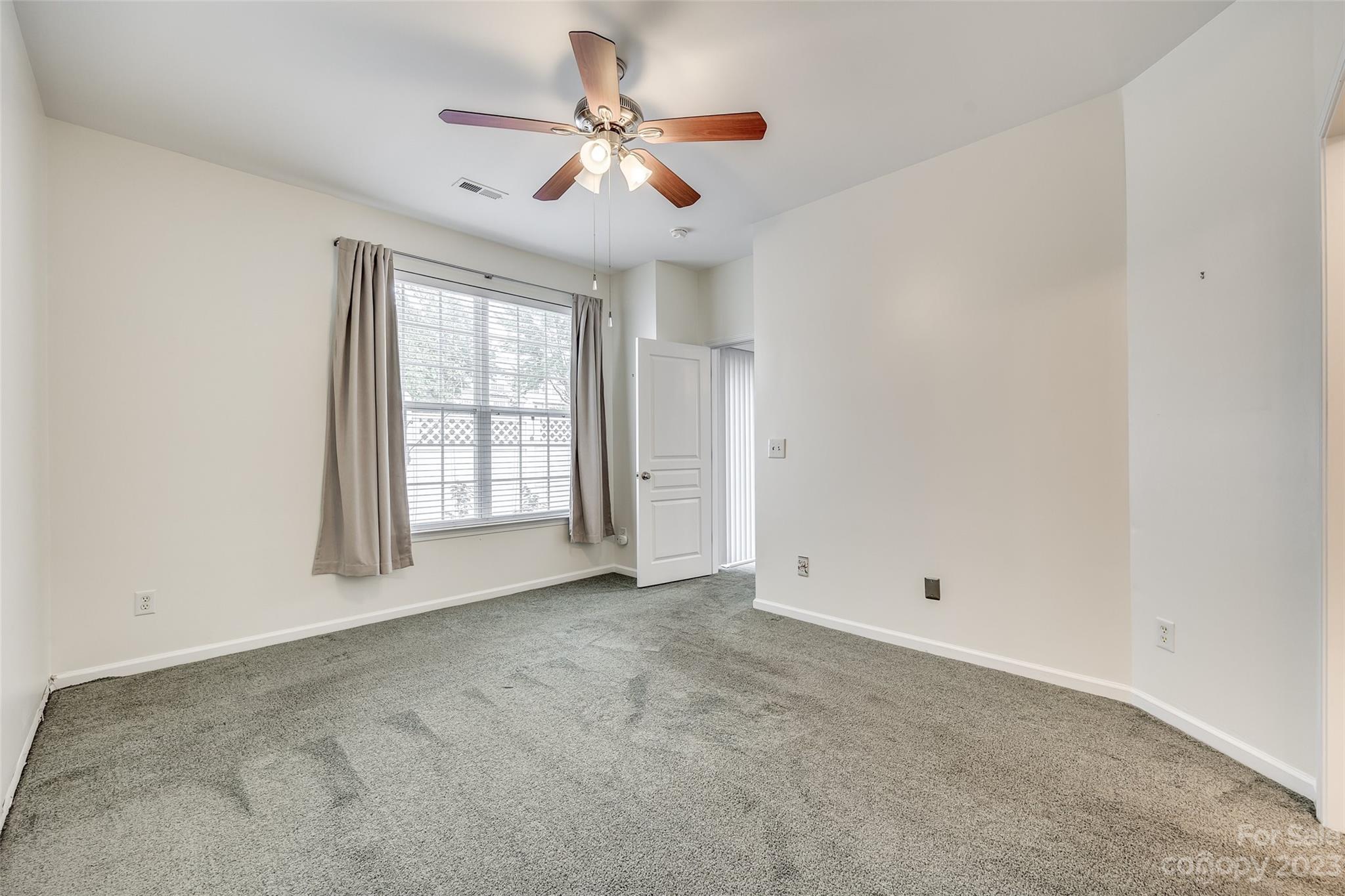 958 Copperstone Lane Fort Mill, SC 29708 - Photo 9 of 29 a view of an empty room with a window