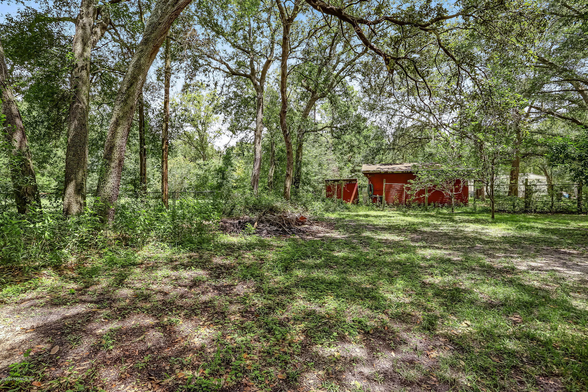 85161 Joann Road Yulee, FL 32097 - Photo 1 of 46 85161+Joann+Rd+Yulee-38-web-Back+Yard