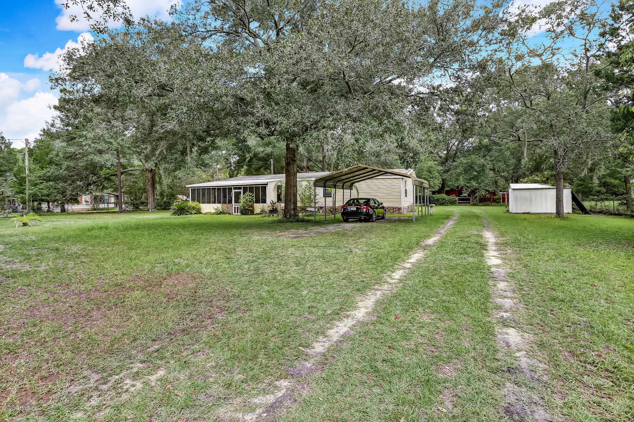 85161 Joann Road Yulee, FL 32097 - Photo 12 of 46 85161+Joann+Rd+Yulee-3-web-Front+Yard