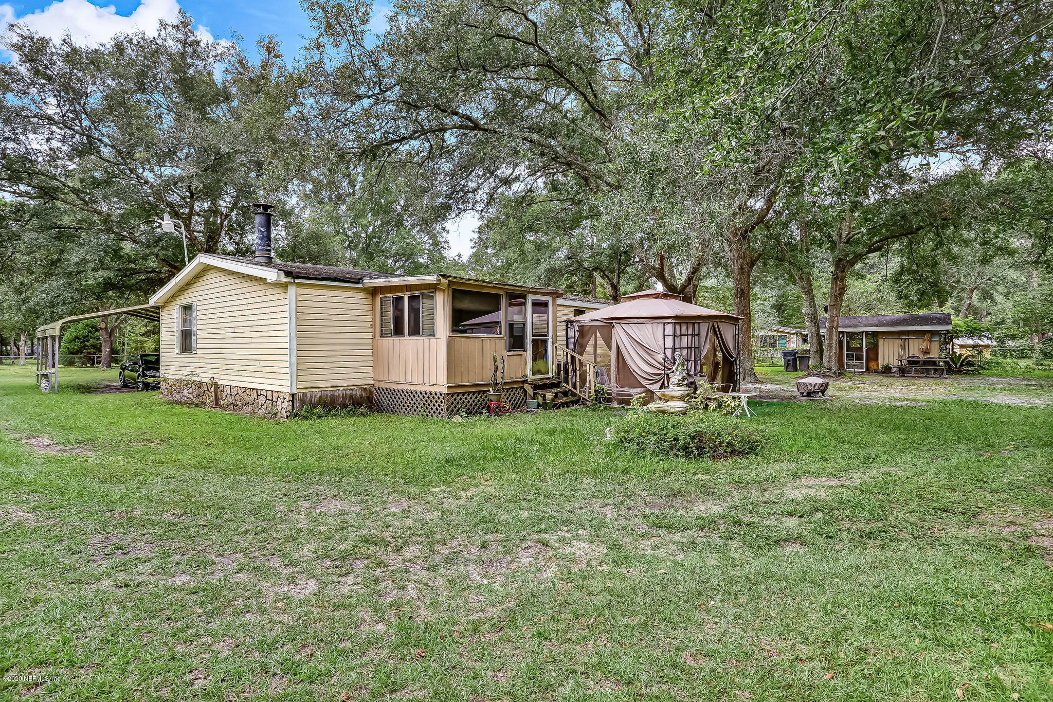 85161 Joann Road Yulee, FL 32097 - Photo 39 of 46 85161+Joann+Rd+Yulee-30-web-Back+of+Home