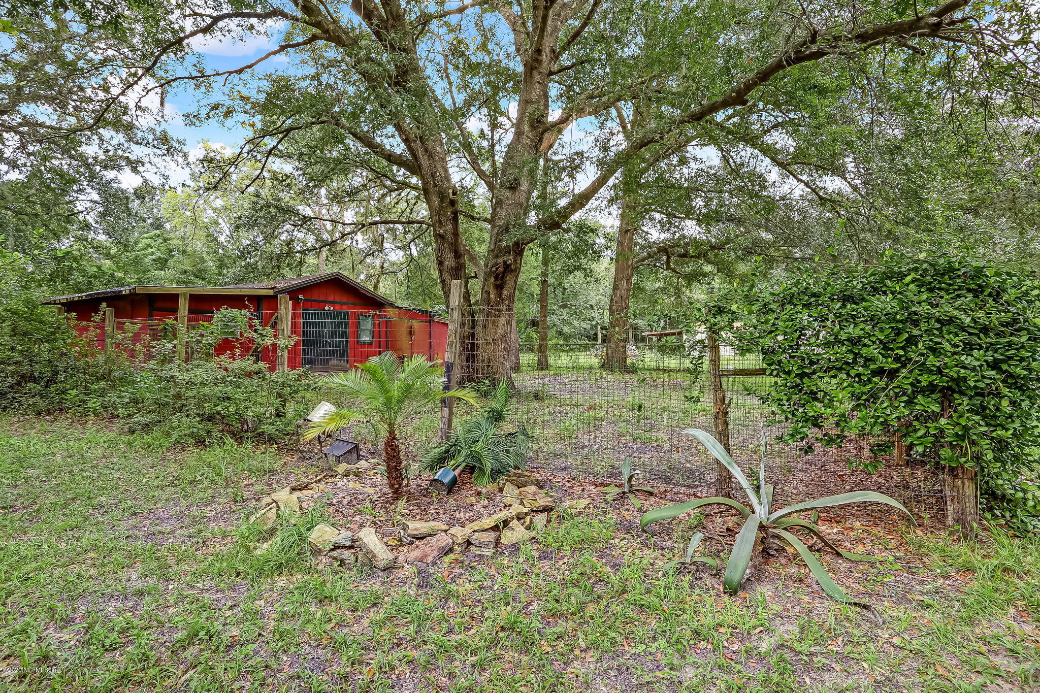 85161 Joann Road Yulee, FL 32097 - Photo 4 of 46 85161+Joann+Rd+Yulee-41-web-Back+Yard