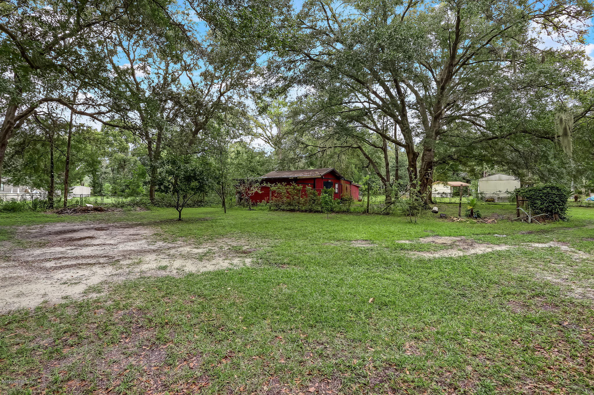 85161 Joann Road Yulee, FL 32097 - Photo 6 of 46 85161+Joann+Rd+Yulee-43-web-Back+Yard