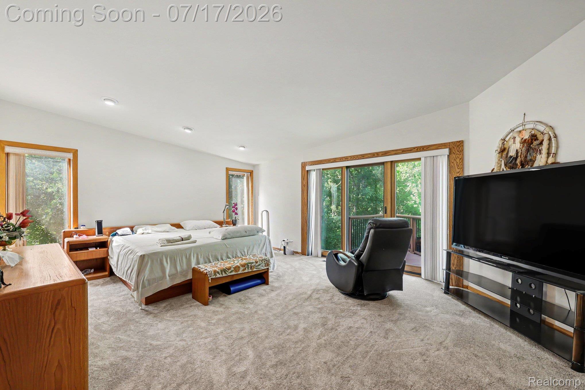 5685 Paint Valley Drive Rochester, MI 48306 - Photo 19 of 66 Spacious room featuring light gray carpet, recessed lighting, and white walls